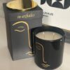 Southside double-wick candle in black vessel with gold lid